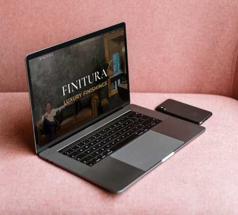 Finitura website design by Polka Dot Marketing shown on MacBook